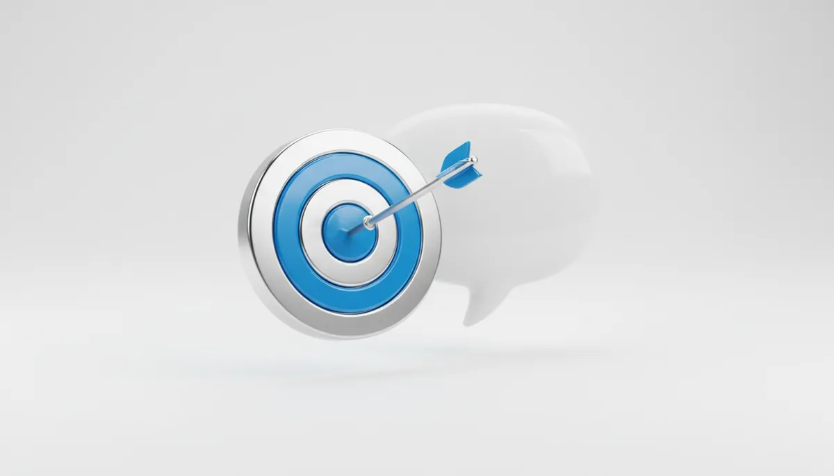 A chrome and blue target with an arrow that has landed slightly off the bullseye